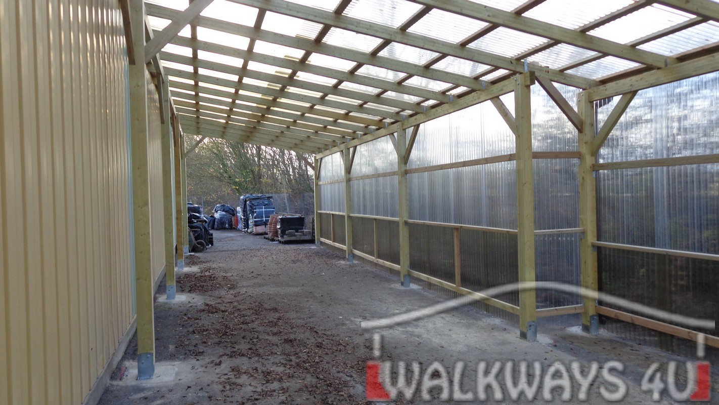 Custom built commercial buildings. Constructions from laminated wood. Covered walkways. 