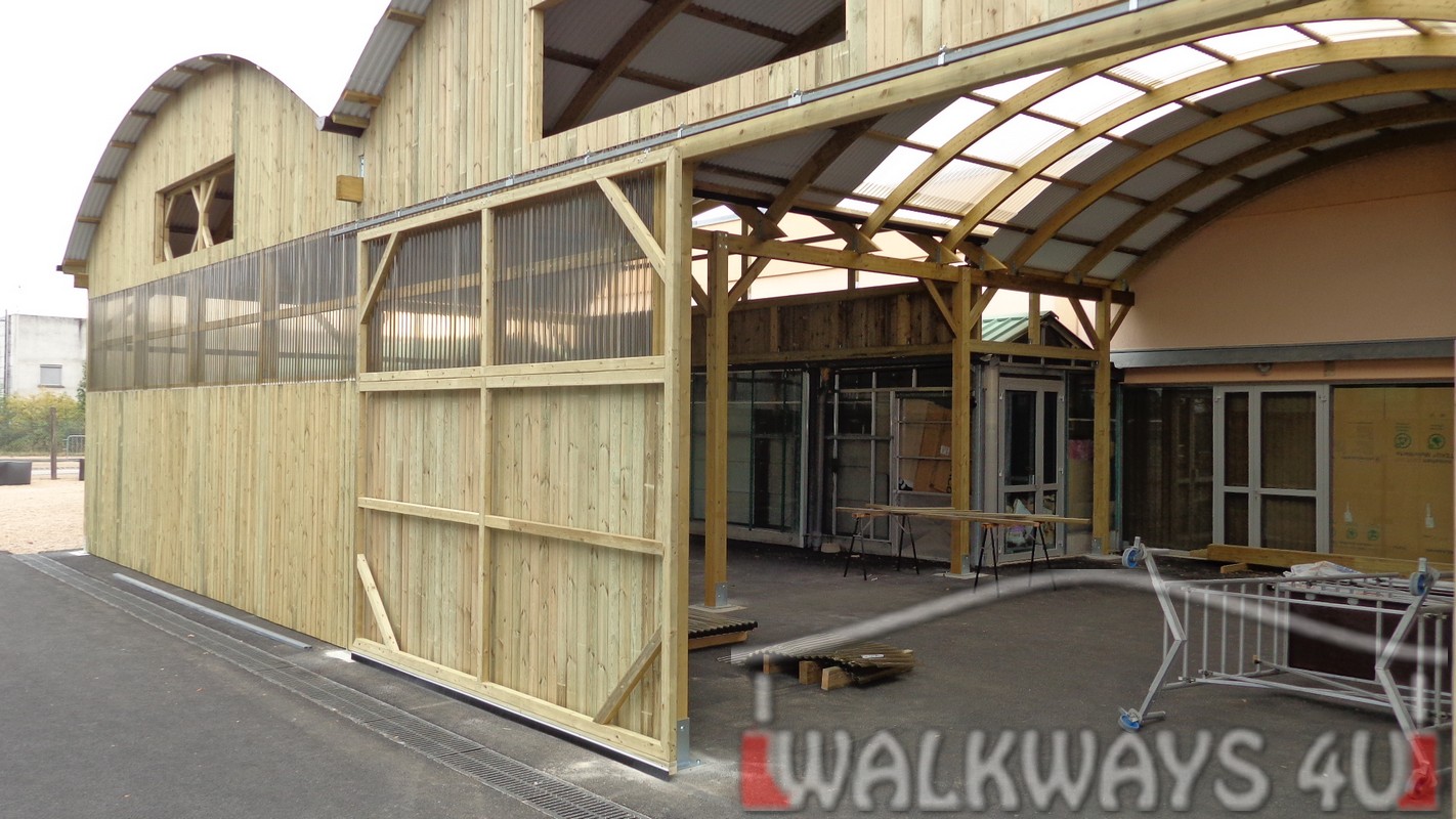 Covered walkways. Custom built commercial buildings. Constructions from laminated wood.