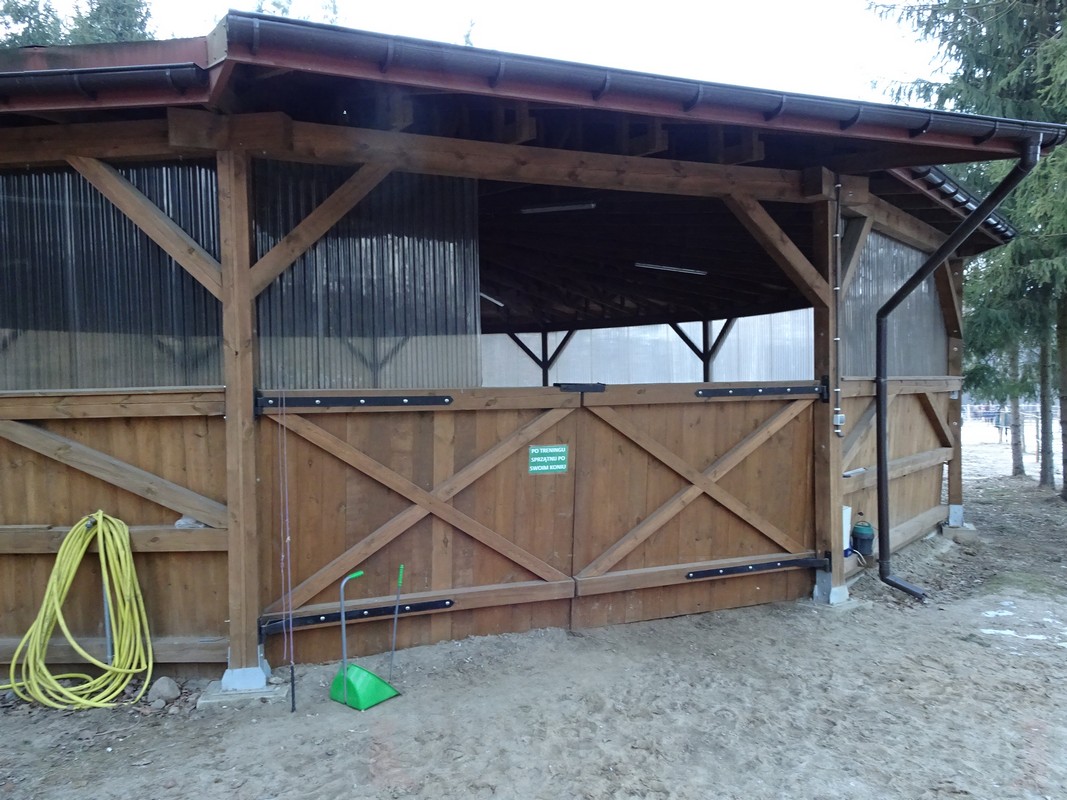 Photo 21. Fully covered lunge pen for lungeing or working horses. The fully covered roof is constructed with laminated wood