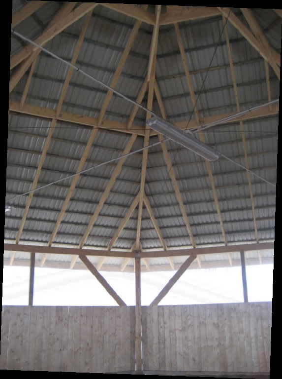 Photo 24. Fully covered lunge pen for lungeing or working horses. The fully covered roof is constructed with laminated wood