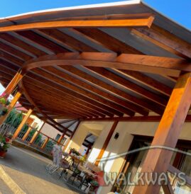 Półokrągłe koliste lub owalne zadaszenia tarasów z drewna klejonego kryte szkłem hartowanym od Walkways4U.com